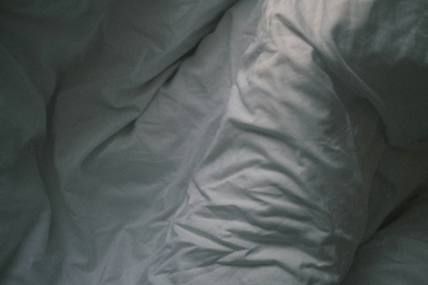What Your Sleeping Position Says About Your Pain—And How to Fix It